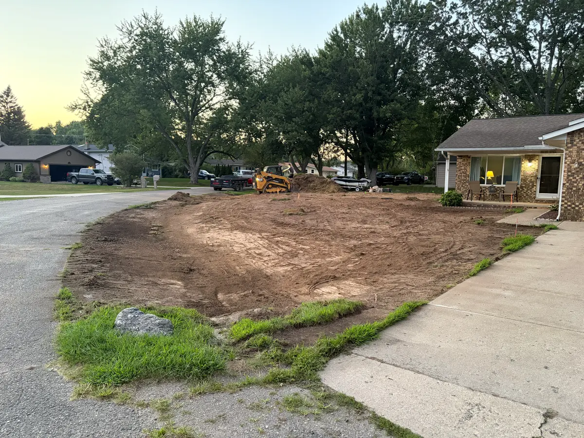 During — Full yard stripped, regraded, and sodded, front to back